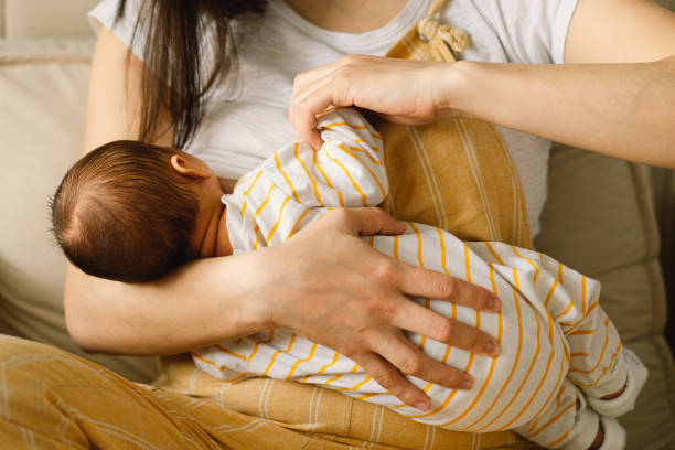 new born baby breastfeeding pic